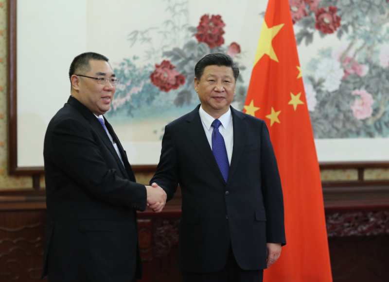 12月23日，國家主席習近平在中南海會見了來京述職的澳門特別行政區行政長官崔世安。新華社記者 蘭紅光 攝