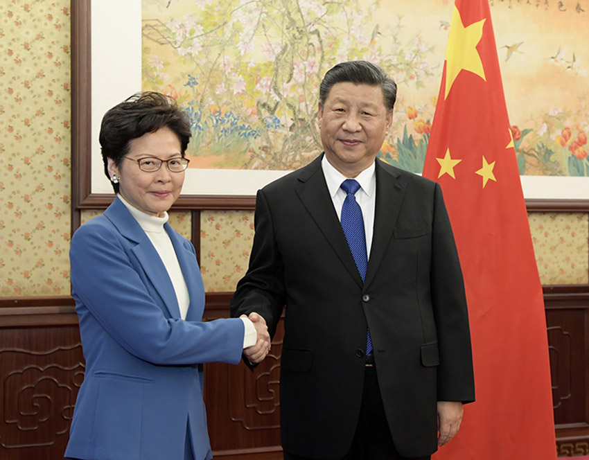 12月16日，國家主席習近平在中南海會見來京述職的香港特別行政區行政長官林鄭月娥。 新華社記者 李學仁 攝
