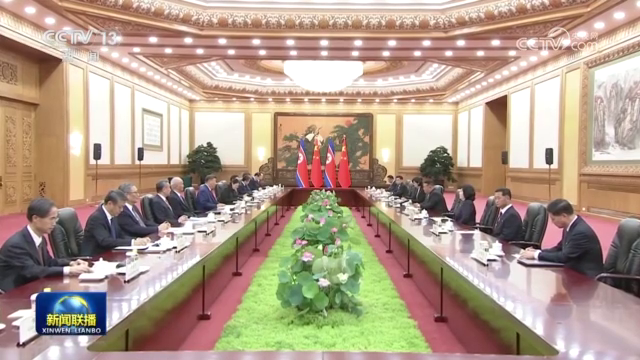 习近平同朝鲜劳动党总书记、国务委员长举行会谈
